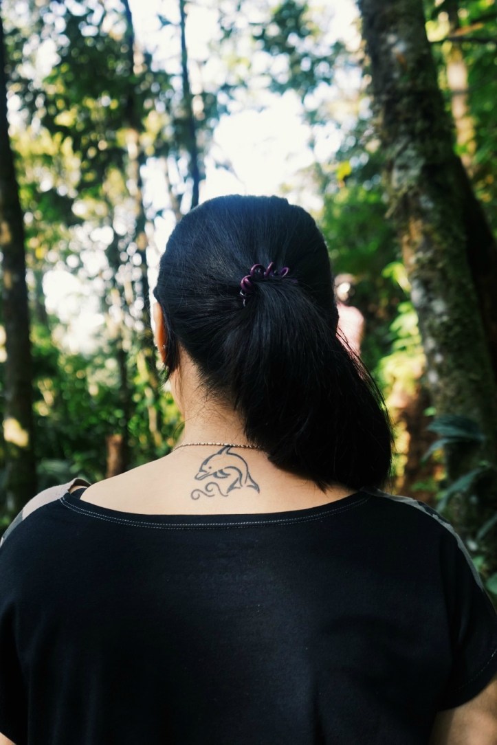 The girl with dolphin tatoo