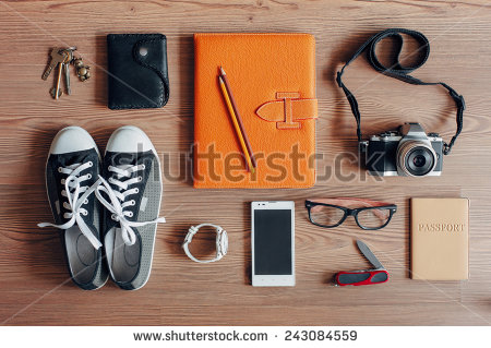stock-photo-outfit-of-traveler-student-teenager-young-woman-or-guy-overhead-of-essentials-for-modern-young-243084559