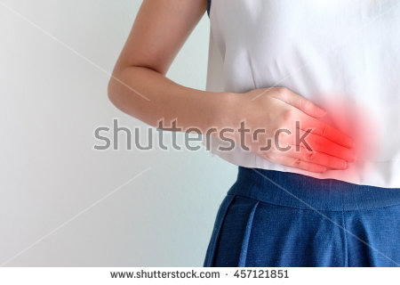 stock-photo-hand-of-woman-stomach-ache-because-of-gastritis-or-menstruation-that-are-sign-of-stomach-trouble-457121851